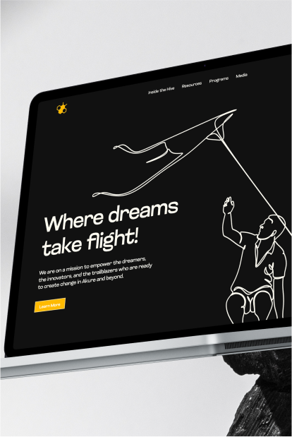 Tablet mockup of The Hive Incubator website on dark background
